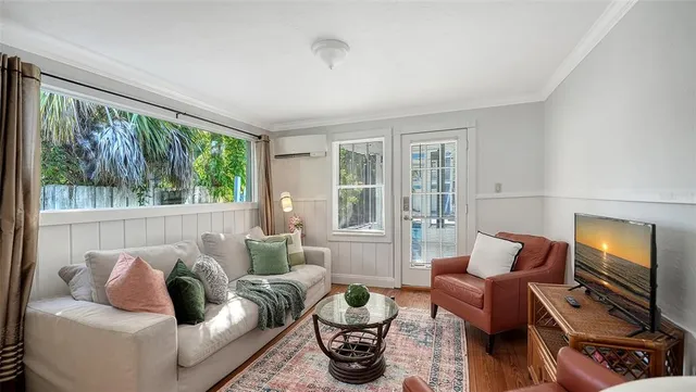 a kitchen with refrigerator and cabinets