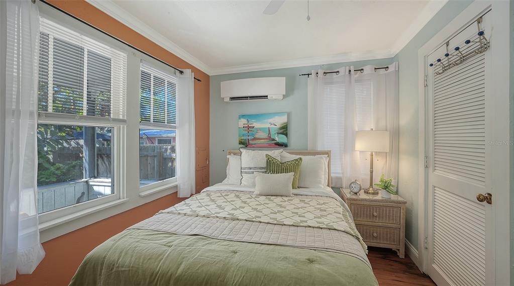 521 Ohio Place Sarasota, FL 34236 - Photo 28 of 48 a bedroom with a large bed and a window