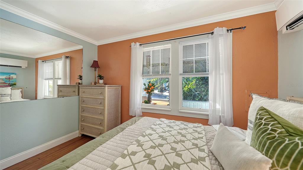 521 Ohio Place Sarasota, FL 34236 - Photo 29 of 48 a bedroom with a bed and a window