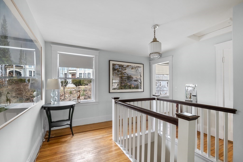 10 High Rock Way Boston, MA 02135 - Photo 14 of 26 a view of a hallway with wooden floor and entryway