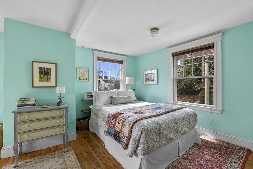 10 High Rock Way Boston, MA 02135 - Photo 18 of 26 a bedroom with a bed and a window