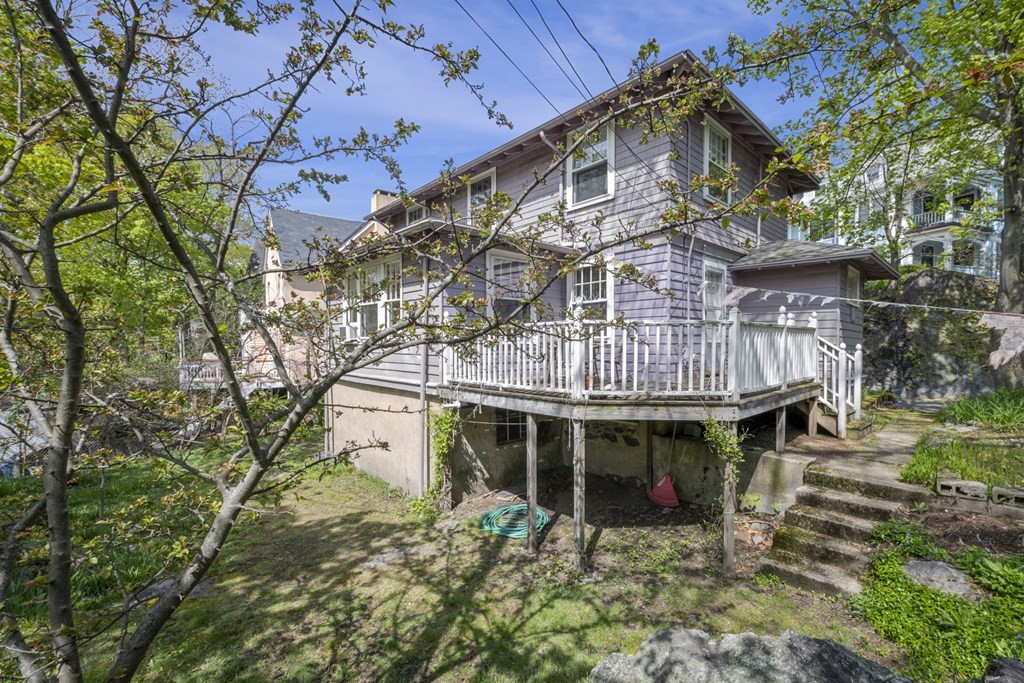 10 High Rock Way Boston, MA 02135 - Photo 21 of 26 a front view of a house with garden