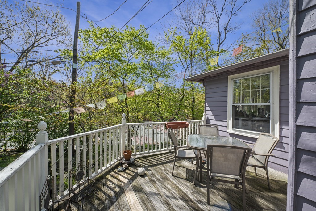 10 High Rock Way Boston, MA 02135 - Photo 22 of 26 a view of a chair and table in the balcony