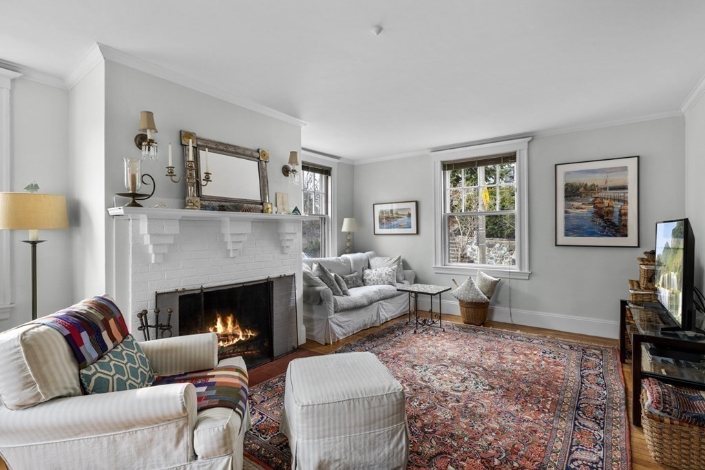 10 High Rock Way Boston, MA 02135 - Photo 7 of 26 a living room with furniture and a fireplace