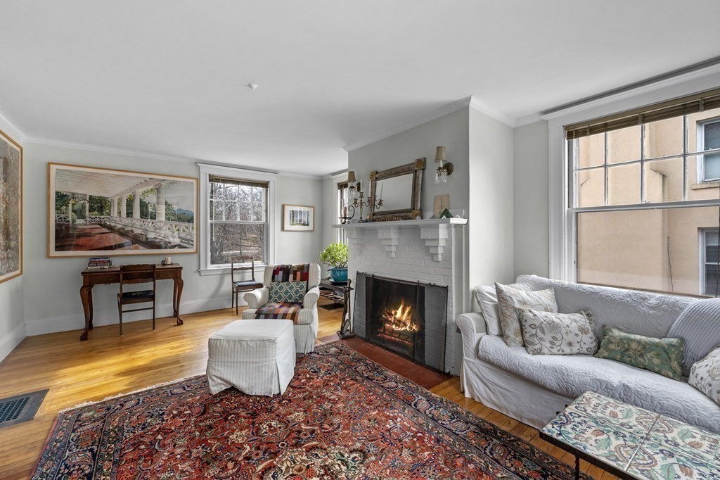 10 High Rock Way Boston, MA 02135 - Photo 8 of 26 a living room with furniture and a fireplace