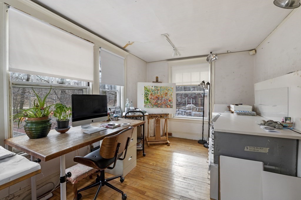 10 High Rock Way Boston, MA 02135 - Photo 9 of 26 a view of a workspace with furniture and a window