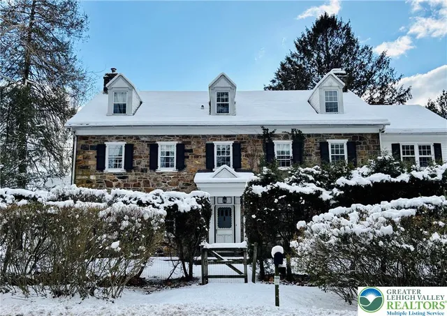 a front view of a house with a porch
