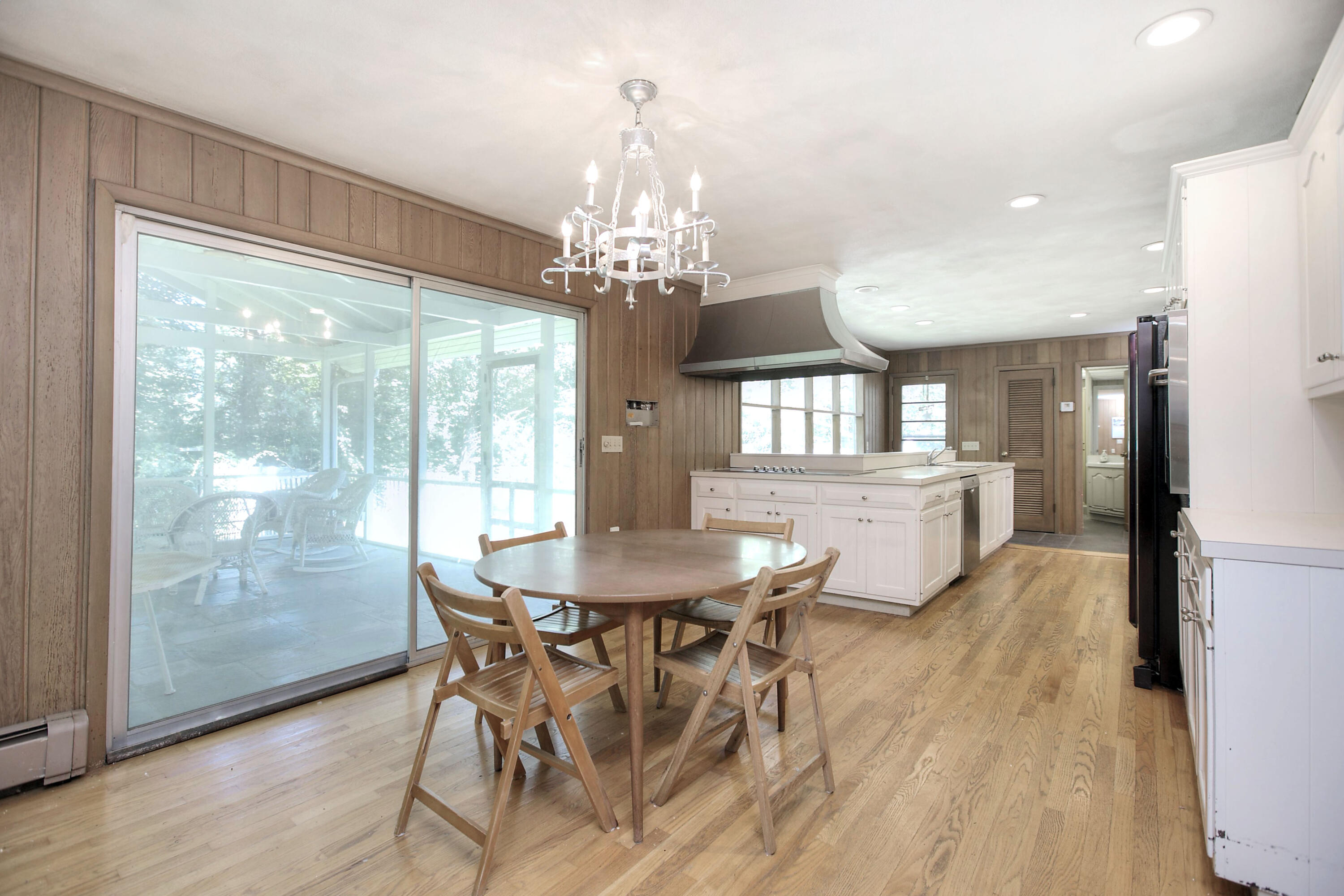 25 Hillcrest Road New Canaan, CT 06840 - Photo 5 of 19 a view of a dining room with furniture window and wooden floor
