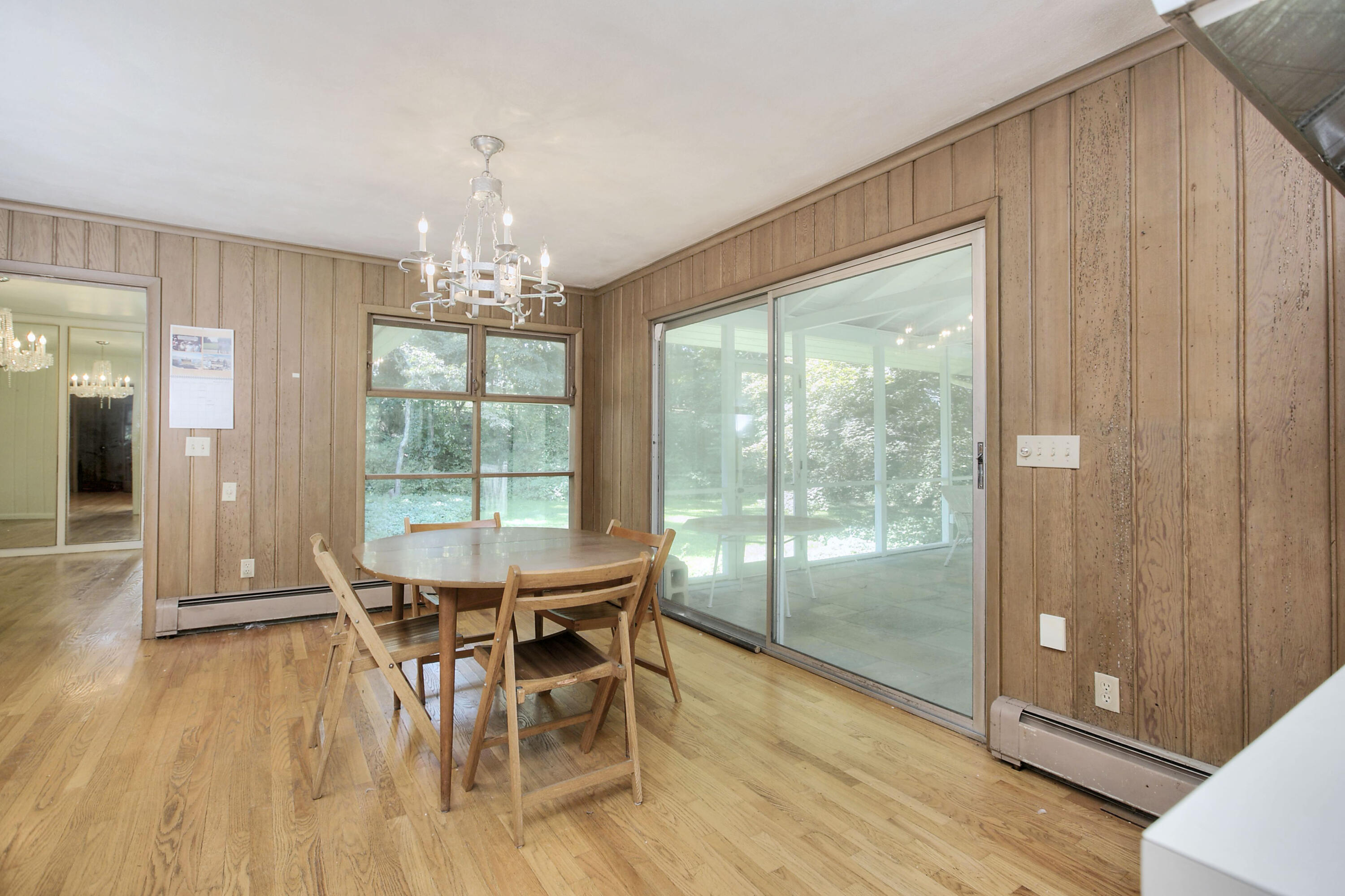 25 Hillcrest Road New Canaan, CT 06840 - Photo 6 of 19 a view of a dining room with furniture window and wooden floor