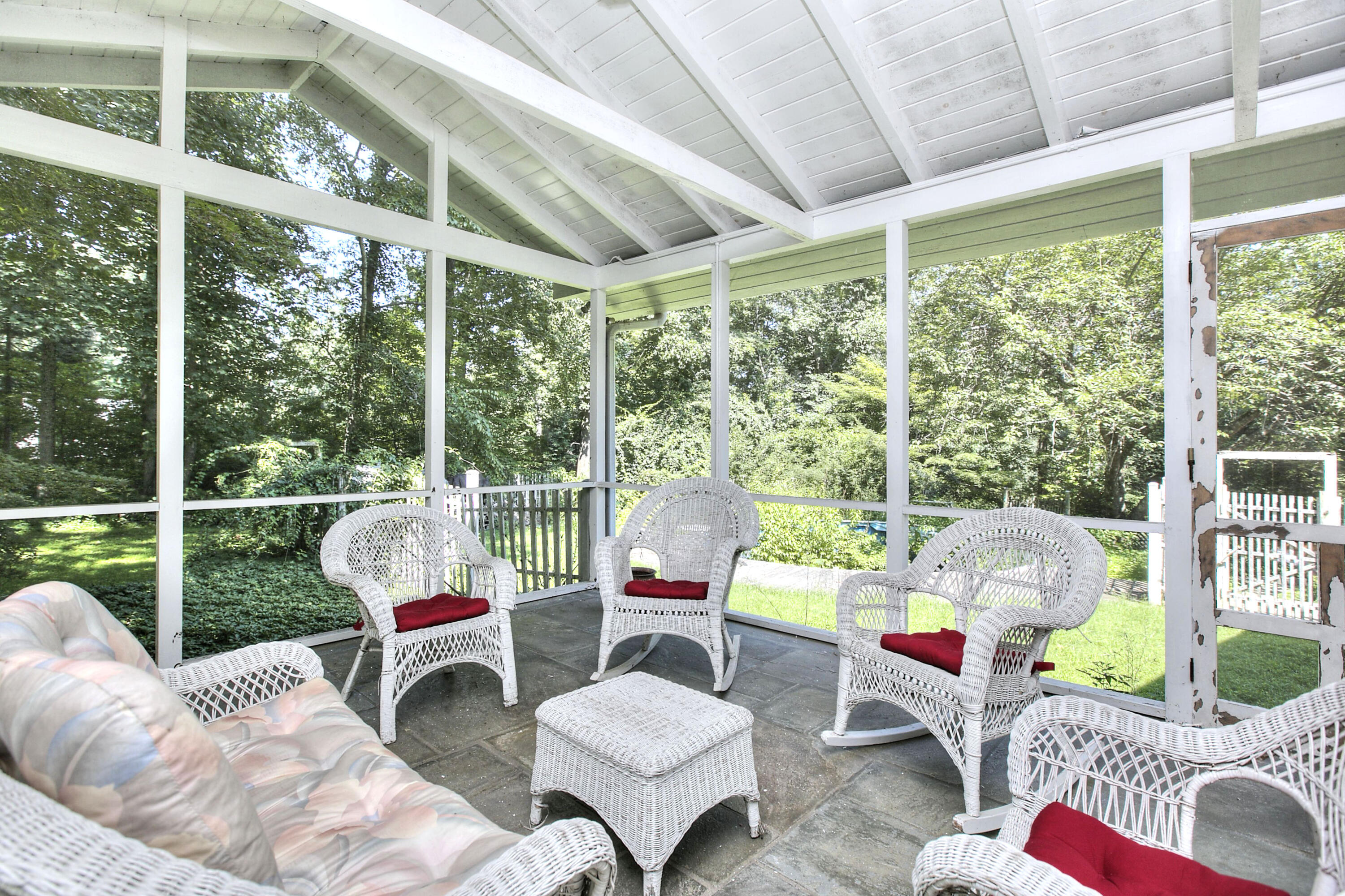 25 Hillcrest Road New Canaan, CT 06840 - Photo 7 of 19 a living room with furniture and floor to ceiling windows