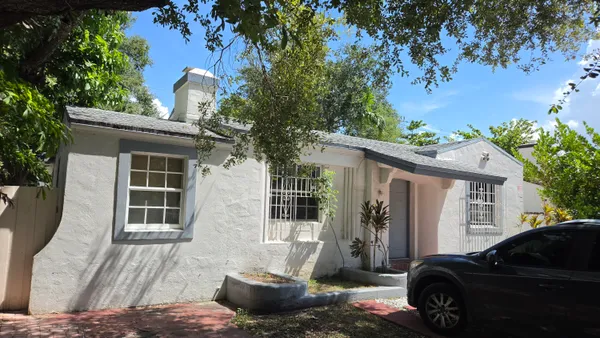 a view of a house with a patio