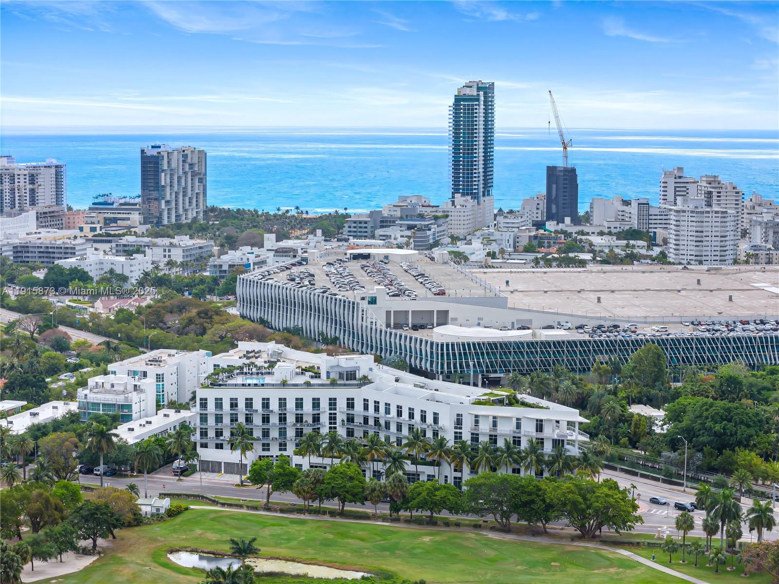 2001 Meridian Avenue, Unit 515 Miami Beach, FL 33139 - Photo 4 of 26 a view of a city with tall buildings and a big yard
