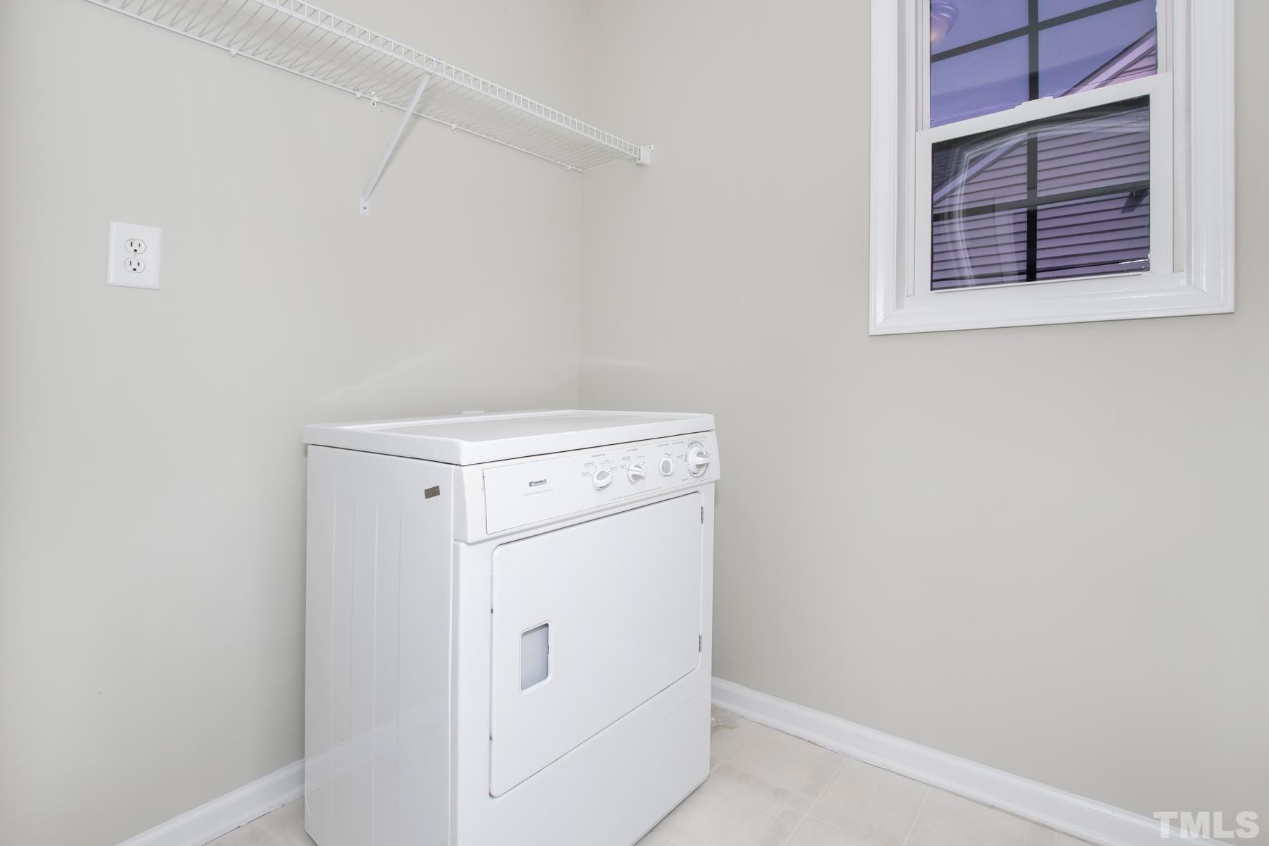 7814 Braefield Drive Raleigh, NC 27616 - Photo 12 of 29 a utility room with dryer and washer