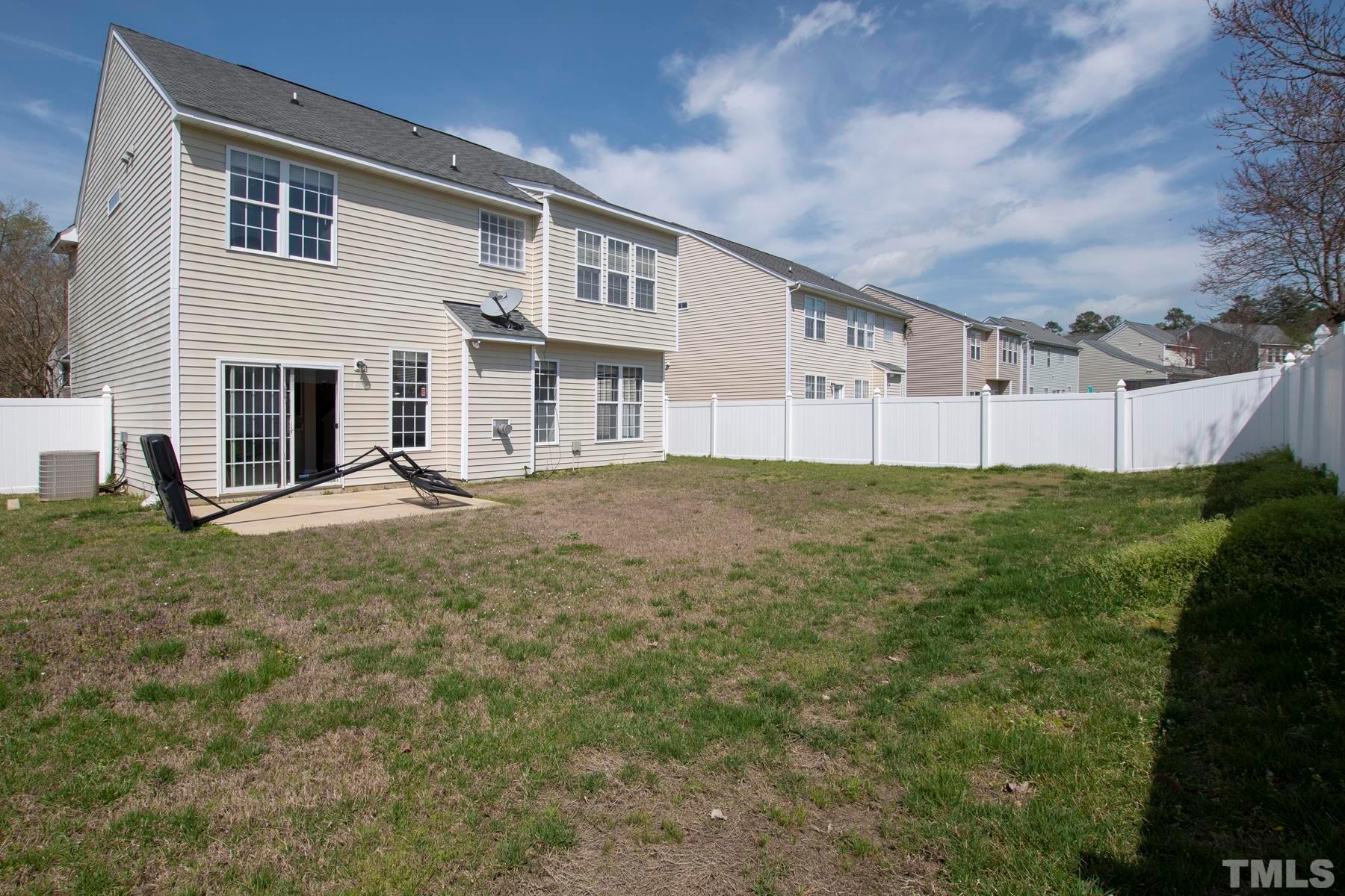 7814 Braefield Drive Raleigh, NC 27616 - Photo 2 of 29 a view of a house with backyard and garden