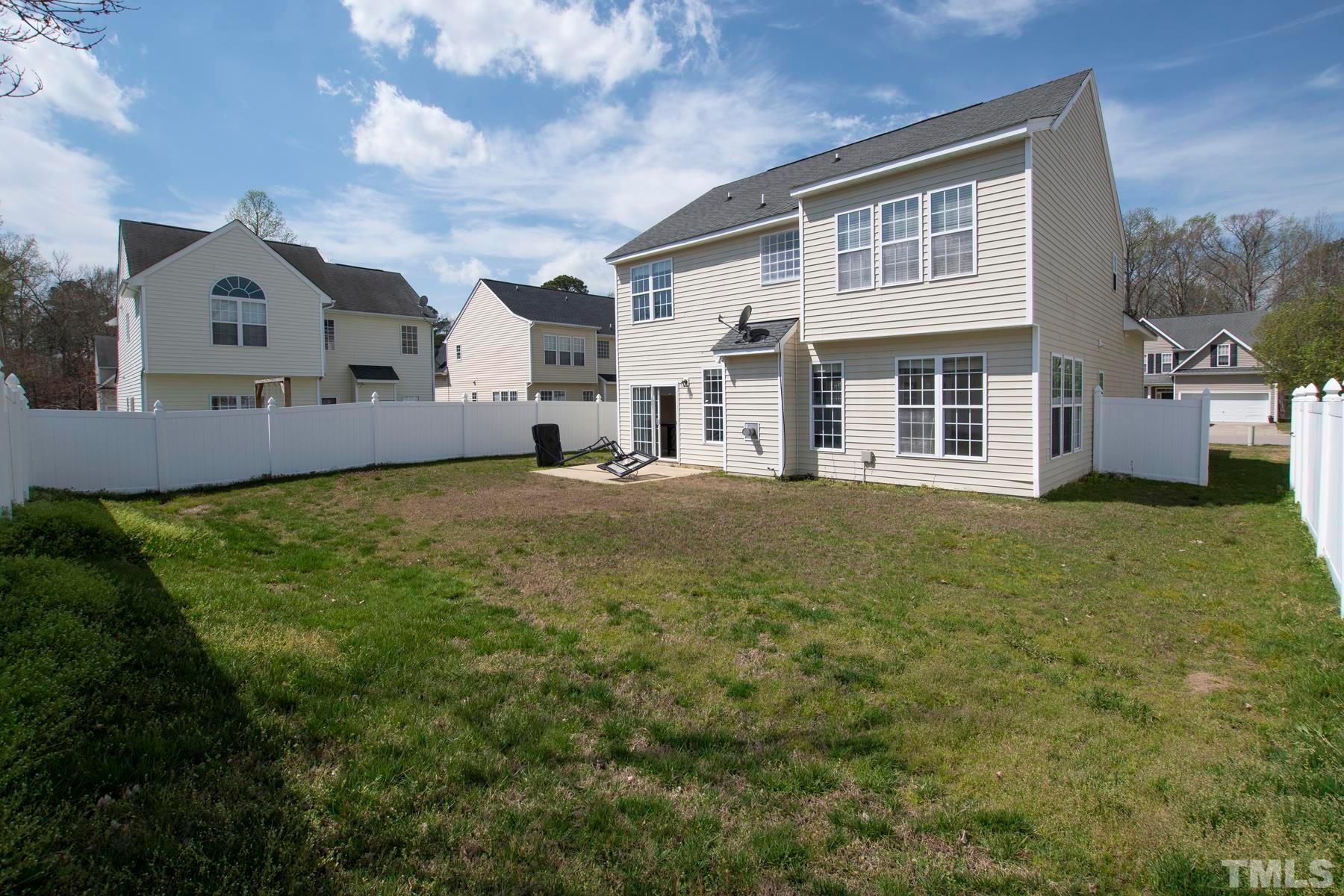 7814 Braefield Drive Raleigh, NC 27616 - Photo 3 of 29 a front view of a house with a yard