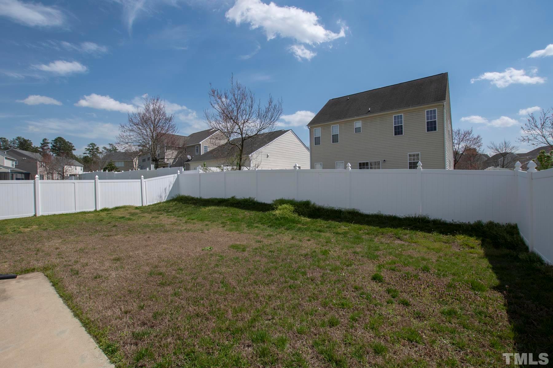 7814 Braefield Drive Raleigh, NC 27616 - Photo 4 of 29 a backyard of a house