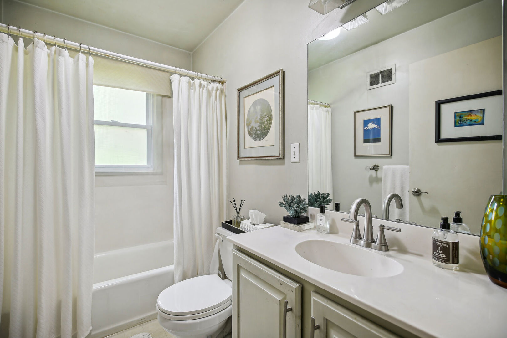 5 Normandy Place Champaign, IL 61821 - Photo 16 of 25 a bathroom with a sink a toilet and shower