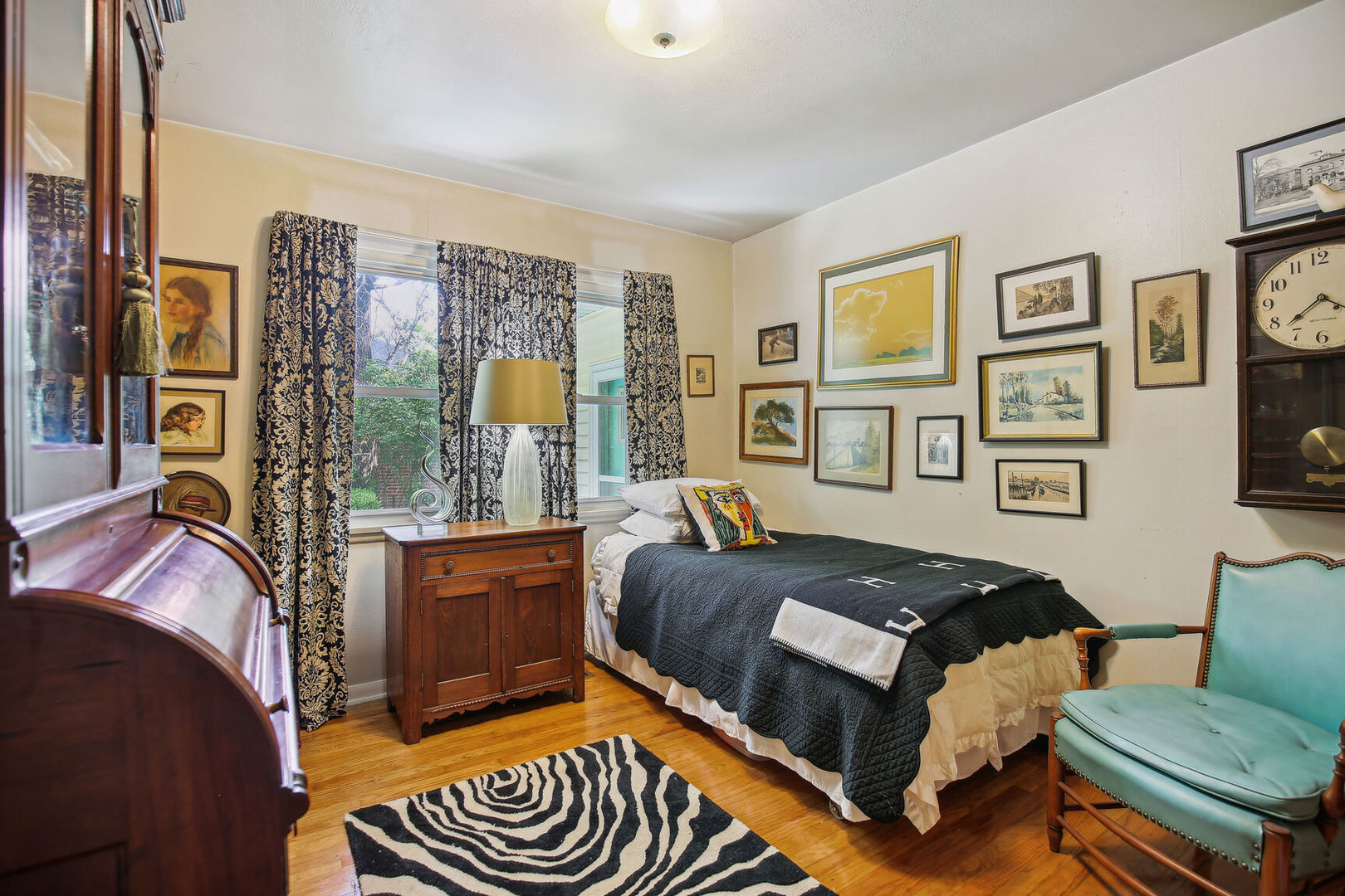 5 Normandy Place Champaign, IL 61821 - Photo 17 of 25 a bedroom with a bed and wooden floor