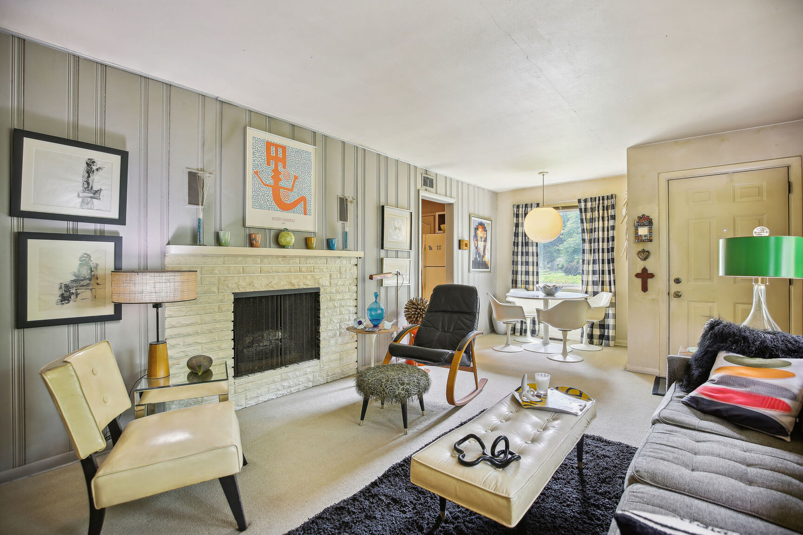 5 Normandy Place Champaign, IL 61821 - Photo 5 of 25 a living room with furniture fireplace and a large window