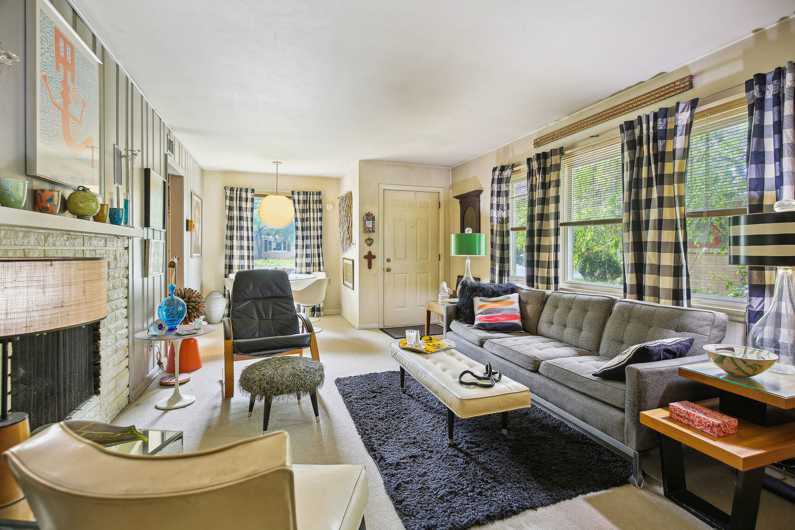 5 Normandy Place Champaign, IL 61821 - Photo 6 of 25 a living room with furniture and a fireplace