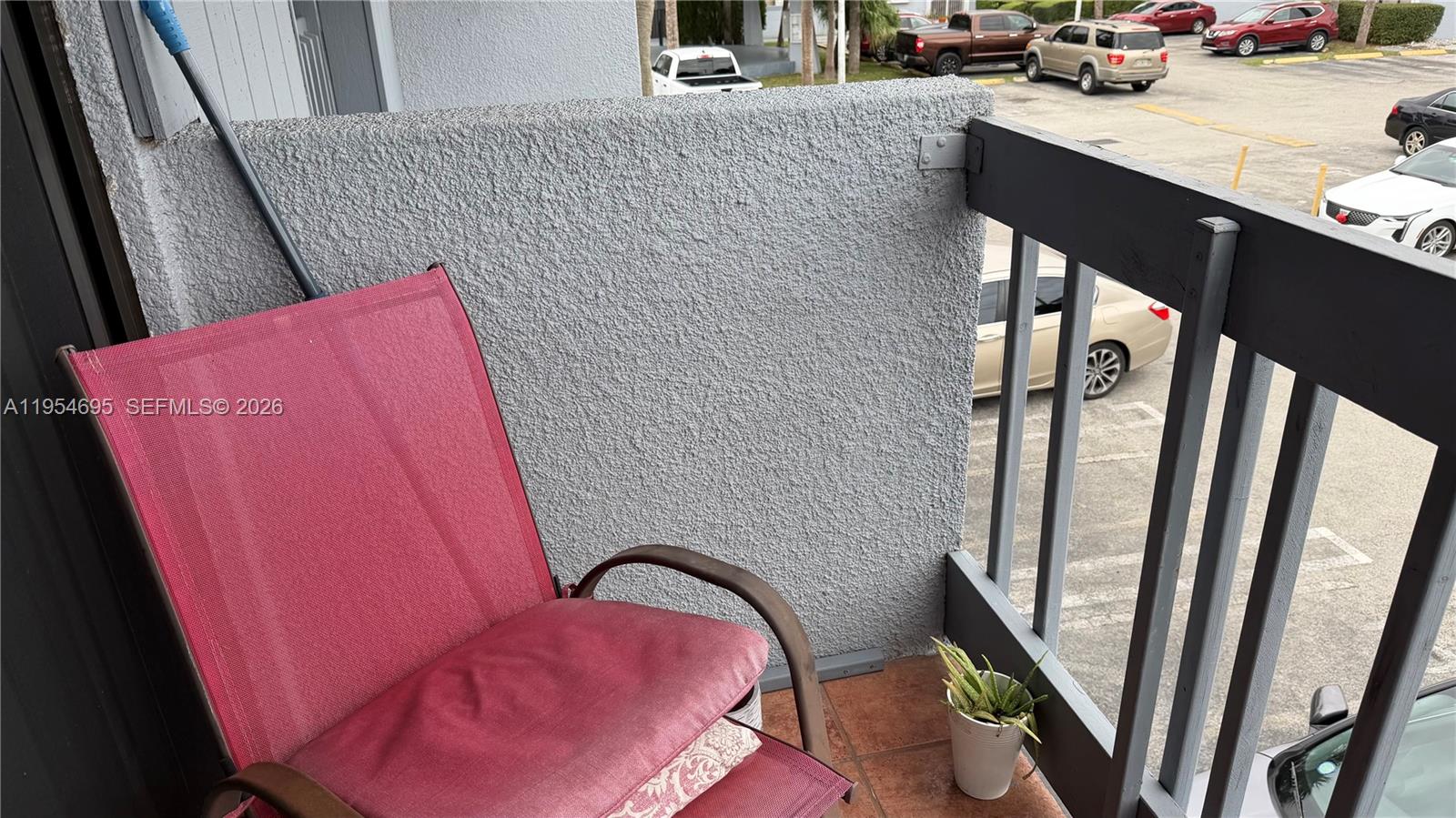 13671 Southwest 62nd Street, Unit 2011 Miami, FL 33183 - Photo 19 of 20 a view of balcony with furniture