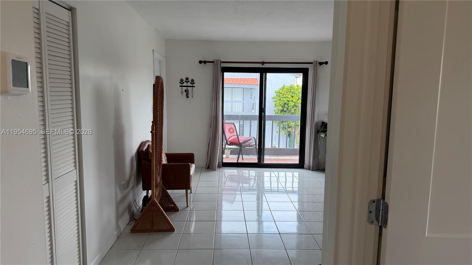 13671 Southwest 62nd Street, Unit 2011 Miami, FL 33183 - Photo 2 of 20 a view of an entryway with livingroom