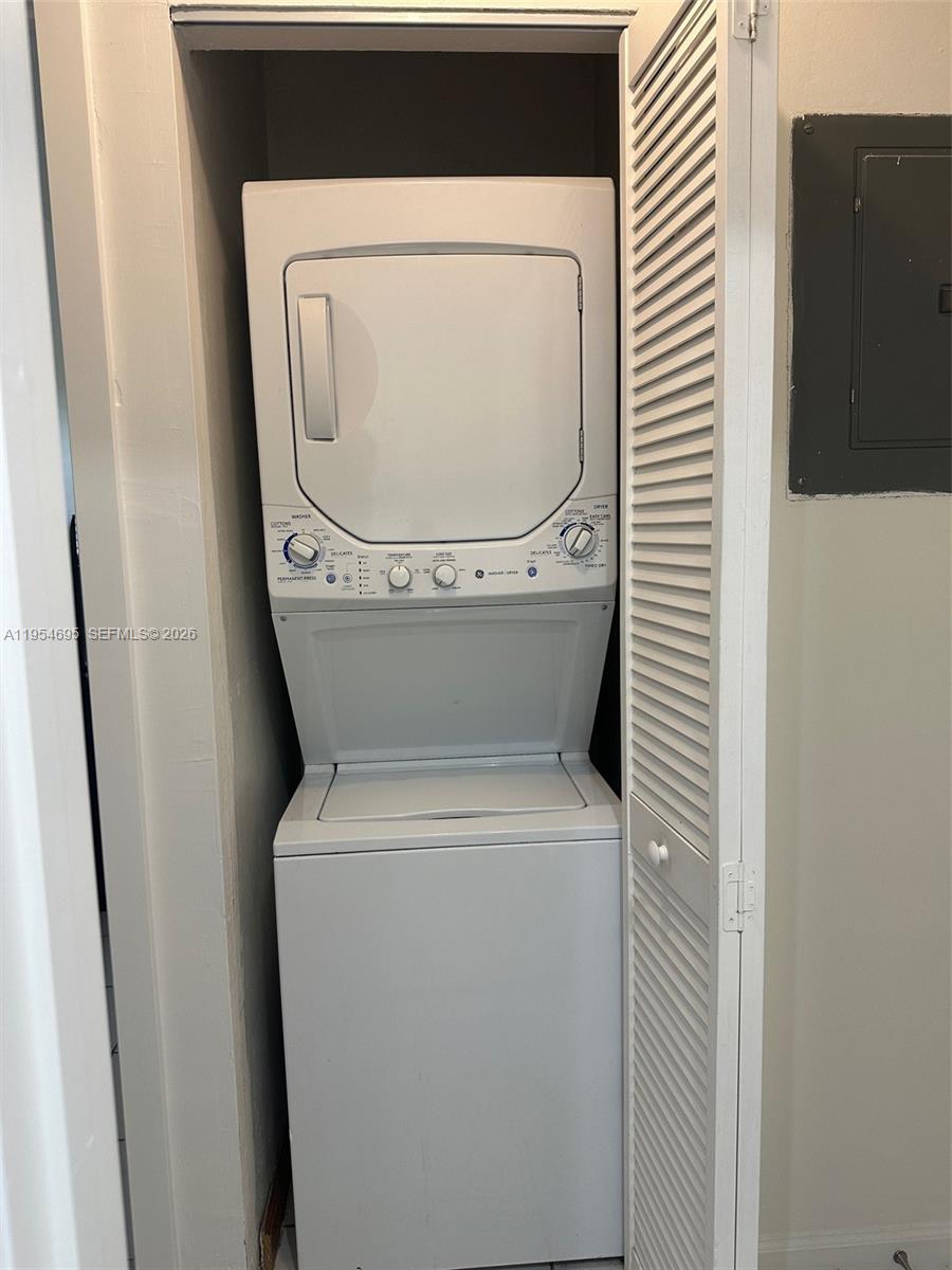 13671 Southwest 62nd Street, Unit 2011 Miami, FL 33183 - Photo 21 of 24 a utility room with dryer and washer