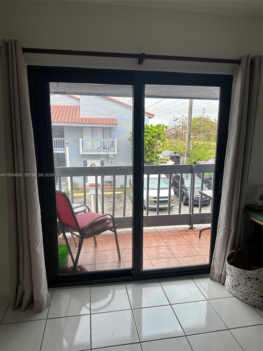 13671 Southwest 62nd Street, Unit 2011 Miami, FL 33183 - Photo 22 of 24 a view of front door