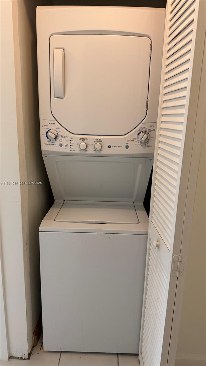 13671 Southwest 62nd Street, Unit 2011 Miami, FL 33183 - Photo 9 of 20 a utility room with dryer and washer
