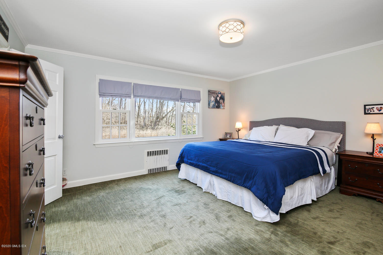 7 Highgate Road Riverside, CT 06878 - Photo 14 of 34 a bedroom with a bed and a window