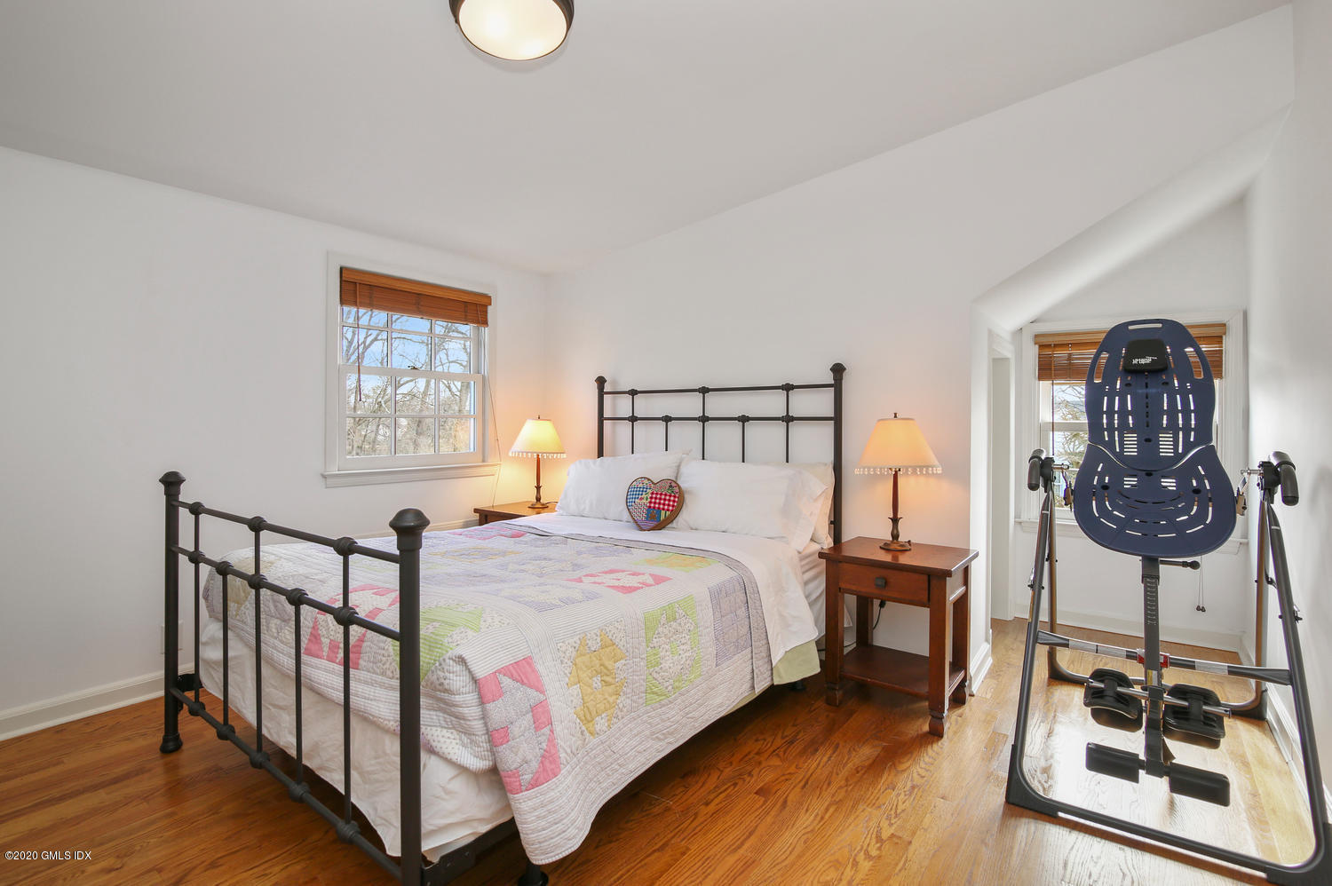 7 Highgate Road Riverside, CT 06878 - Photo 17 of 34 a bedroom with a bed a couch and dresser