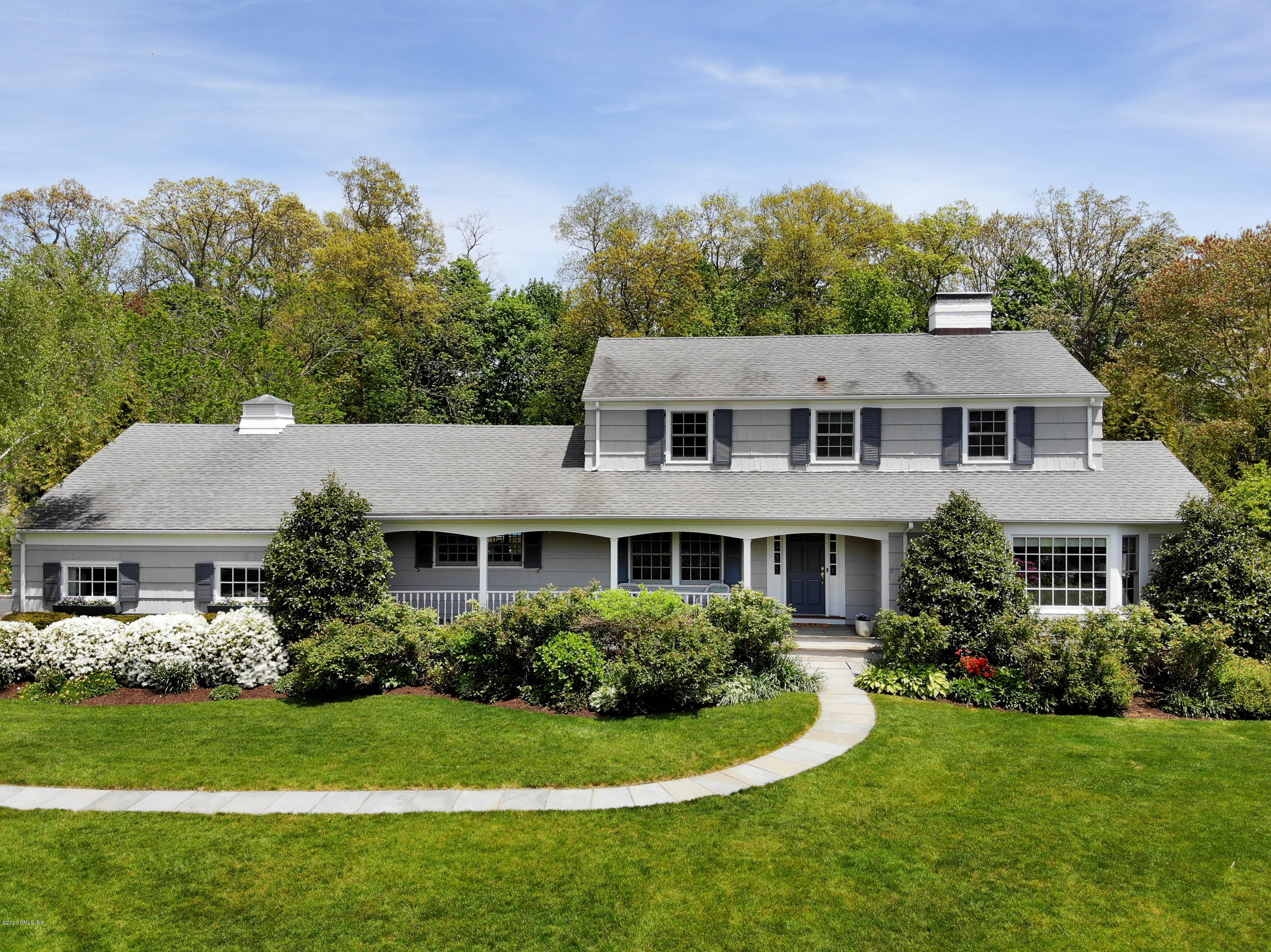 7 Highgate Road Riverside, CT 06878 - Photo 2 of 34 a front view of a house with a yard