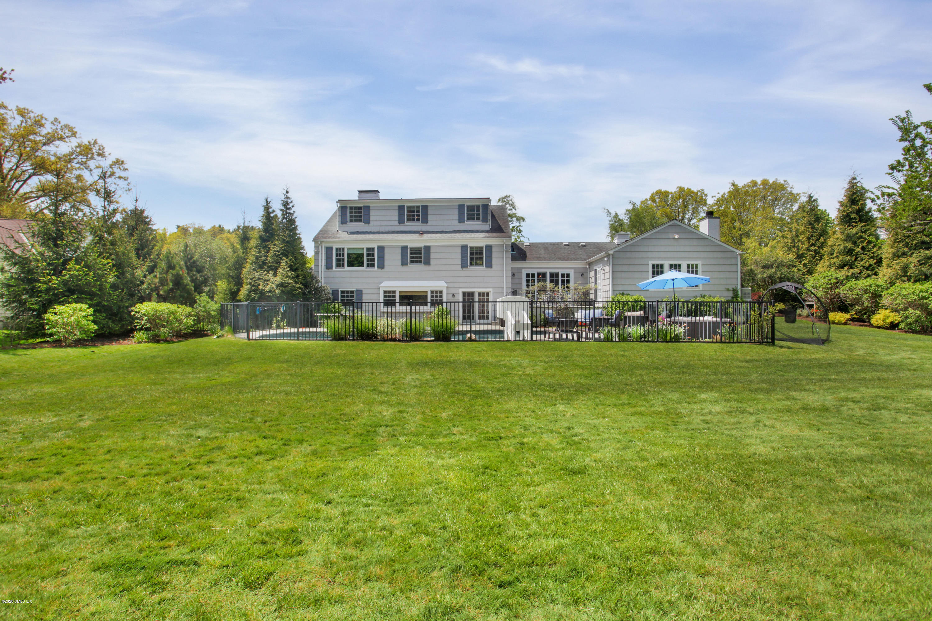 7 Highgate Road Riverside, CT 06878 - Photo 21 of 34 a front view of building with yard