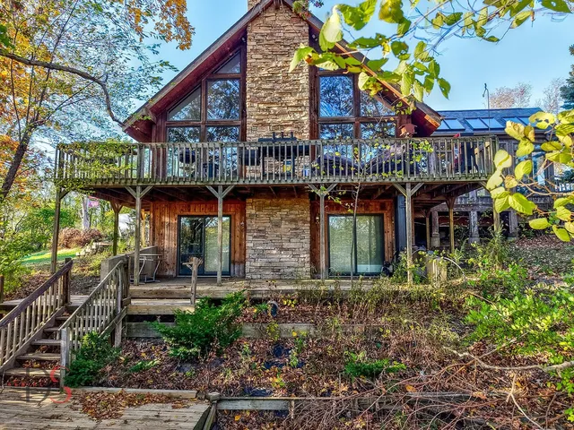 a front view of a building with retail shops