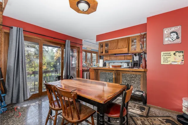 a kitchen with stainless steel appliances granite countertop sink stove and cabinets