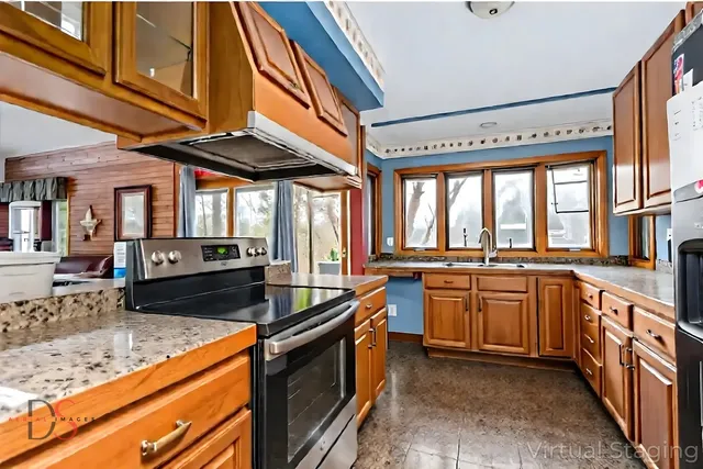 a outdoor dining space with furniture and wooden floor