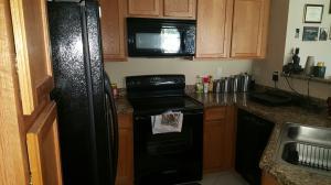 3026 Laurel Ridge Circle Riviera Beach, FL 33404 - Photo 4 of 14 lr kitchen stove