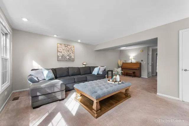 a living room with furniture and a couch