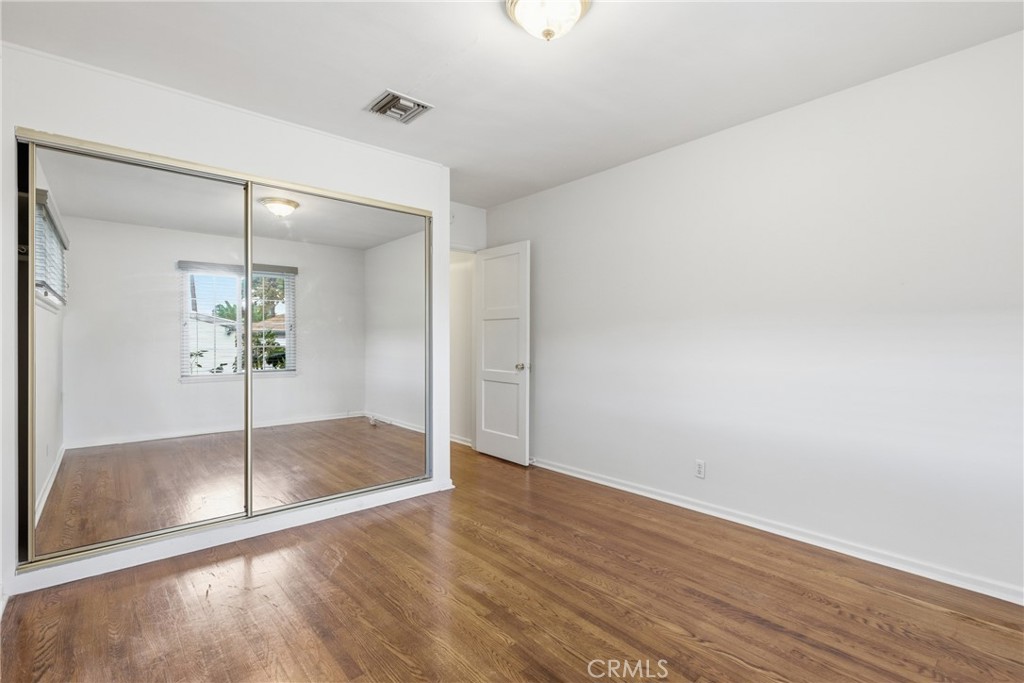 16753 Magnolia Boulevard Encino, CA 91436 - Photo 13 of 30 a view of a livingroom with wooden floor