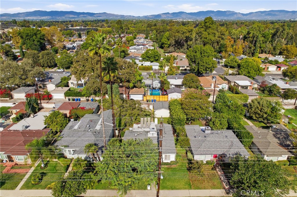 16753 Magnolia Boulevard Encino, CA 91436 - Photo 25 of 30 an aerial view of residential houses with outdoor space