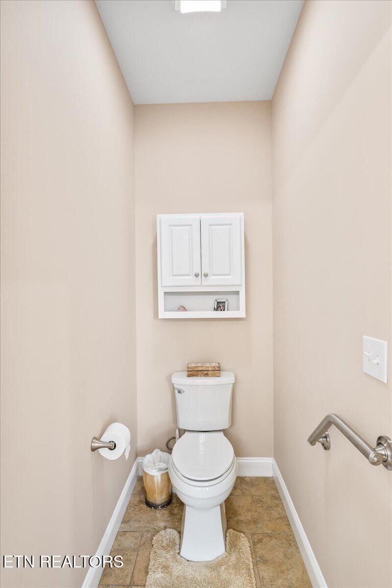 1380 East Norris Point Road La Follette, TN 37766 - Photo 19 of 54 Main Bedroom Toilet