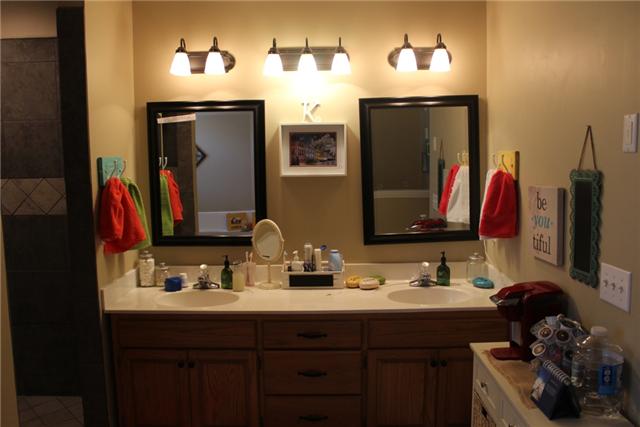 4910 Vincion Road Murfreesboro, TN 37130 - Photo 10 of 20 Master bath has a double vanity, tiled shower & whirlpool tub.