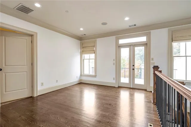a bathroom with a sink mirror and toilet
