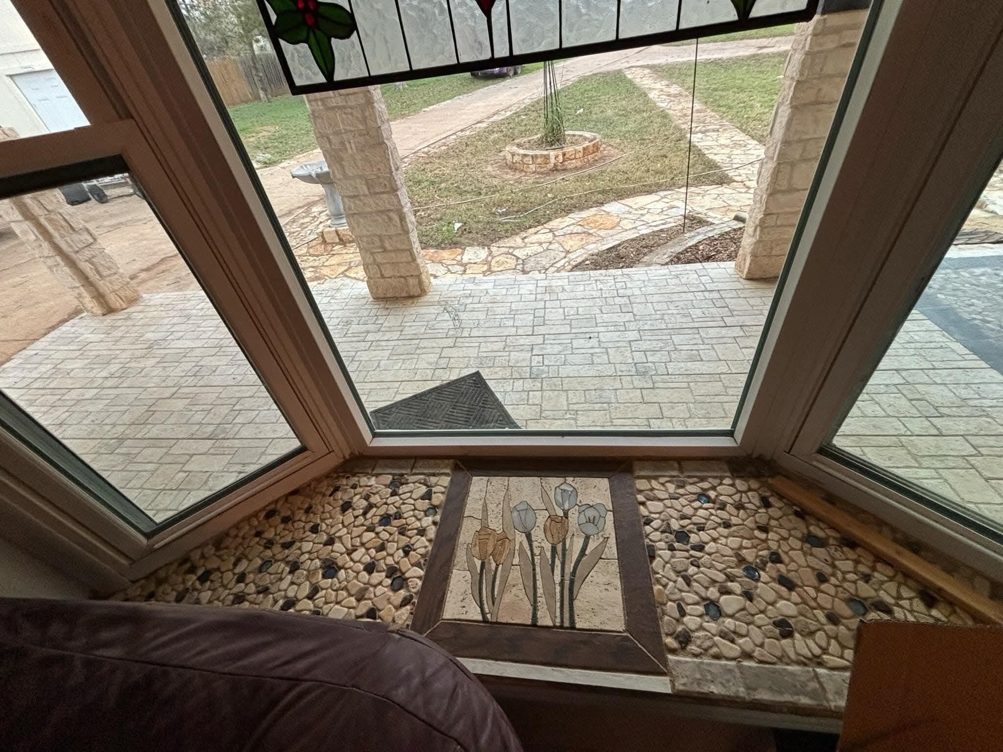 368 Riddle Road Cedar Creek, TX 78612 - Photo 13 of 30 a view of a black door and chair