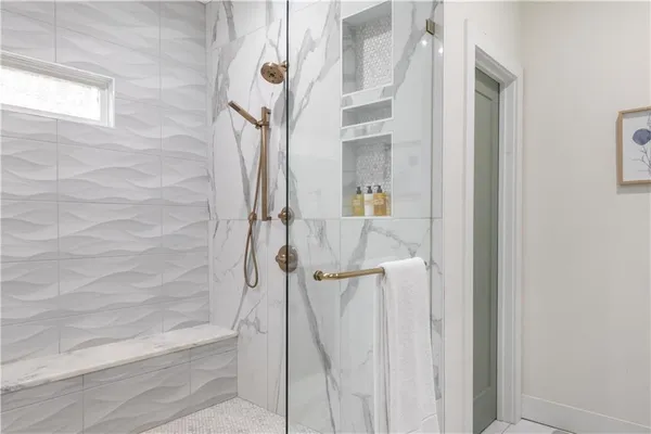 a room with gym equipment and a flat screen tv