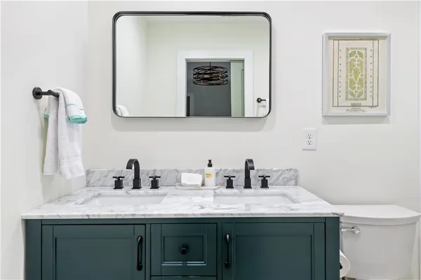 a view of a patio with two chairs and a table