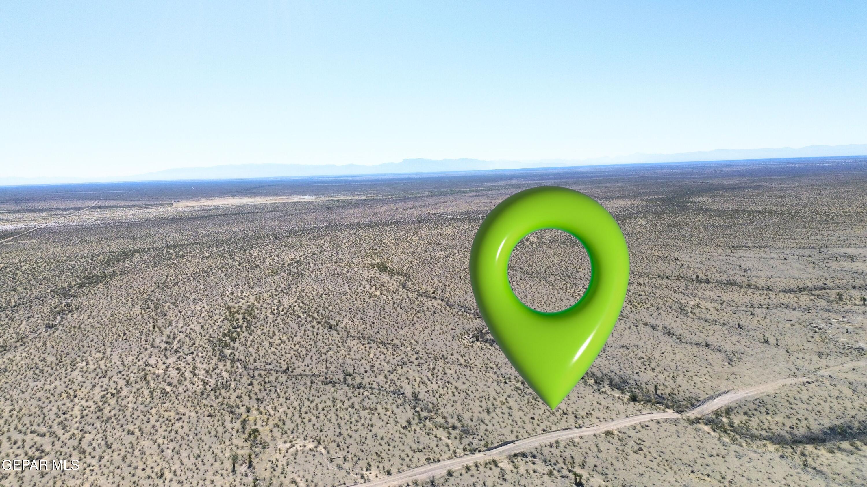 24 Longhorn Ranchettes Ridge Fort Hancock, TX 79839 - Photo 5 of 31 view of a room with a swimming pool and green space