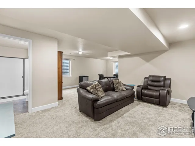 a living room with furniture and a couch