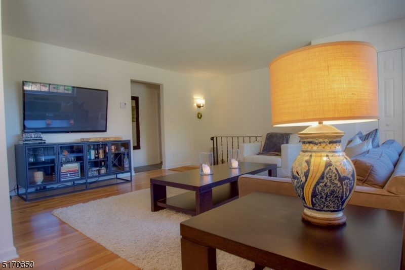 27 Corsa Terrace Ridgewood, NJ 07450 - Photo 3 of 10 a living room with furniture and wooden floor