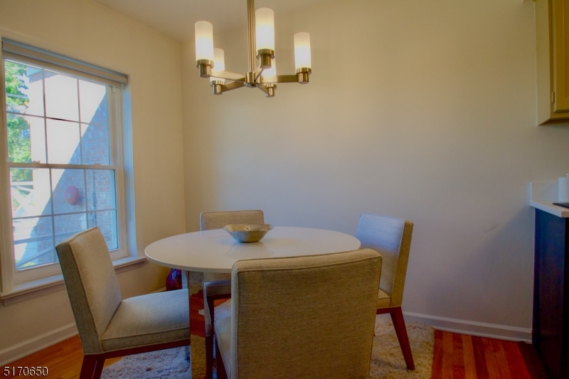 27 Corsa Terrace Ridgewood, NJ 07450 - Photo 7 of 10 a view of a dining room with furniture and a window